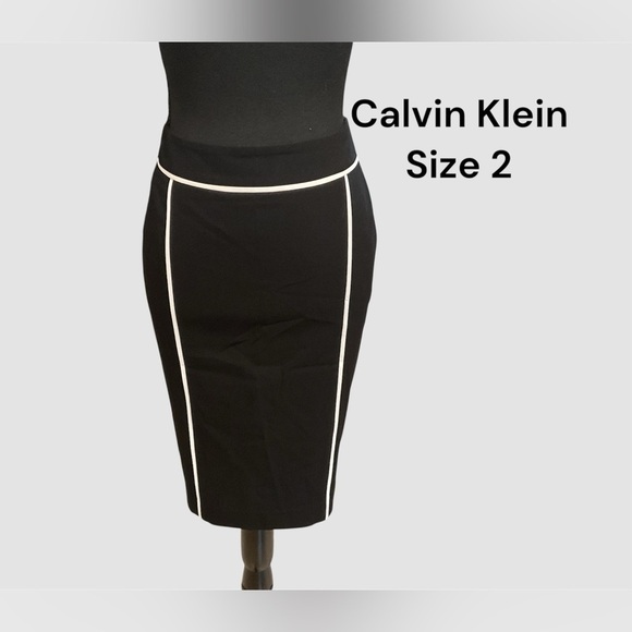 CALVIN KLEIN SIZE 2 BLACK SKIRT WITH WHITE TRIM VERY GENTLY WORN - Picture 1 of 3